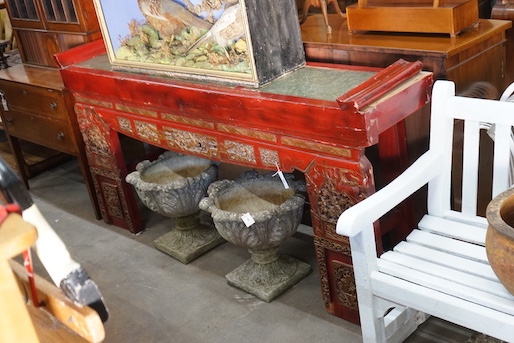 A Chinese carved scarlet and gilt painted altar table with faux stone top, length 198cm, depth 41cm, height 98cm
